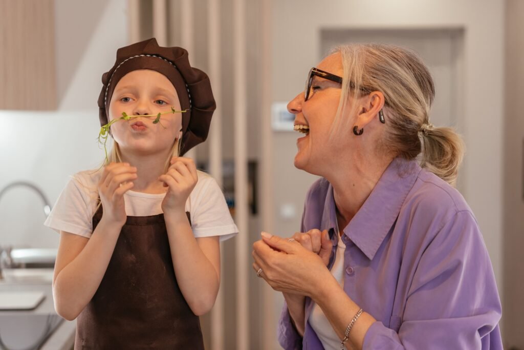Grandmother and granddaughter laughing together